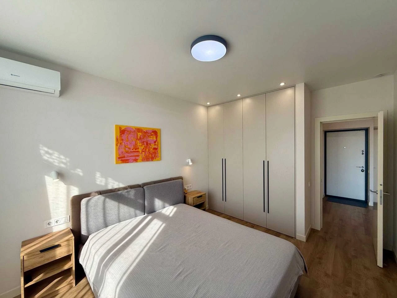 Modern 1-bedroom apartment with separate bedroom and kitchen-living room