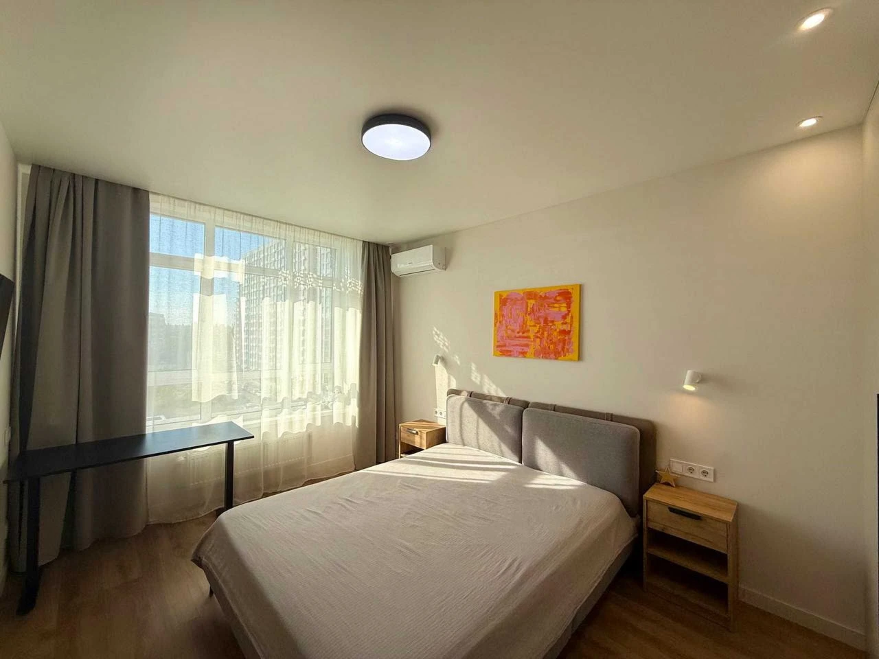 Modern 1-bedroom apartment with separate bedroom and kitchen-living room