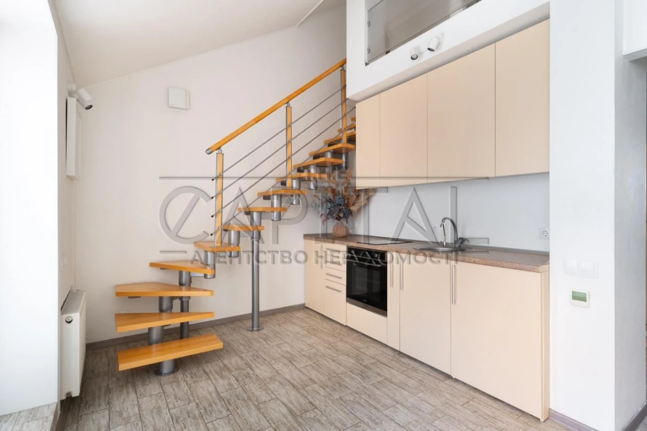 Стильная двухэтажная 1-комнатная квартира 45 м² с террасой в ЖК "Комфорт Таун"