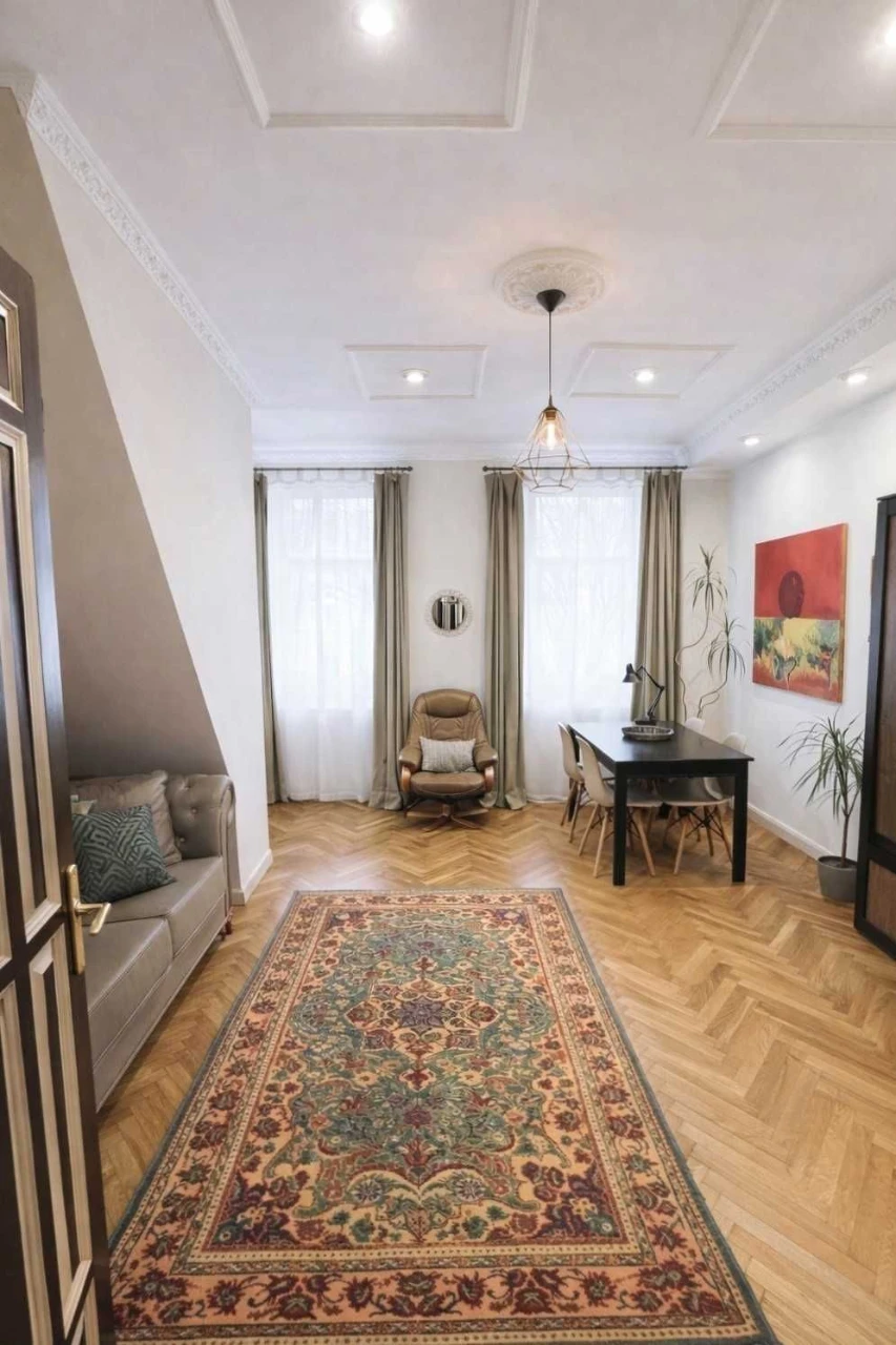 For Sale: Two-Story Apartment with Private Garden