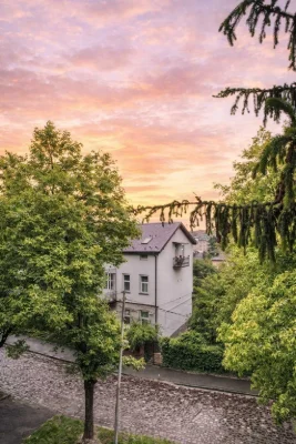 For Sale: Two-Story Apartment with Private Garden