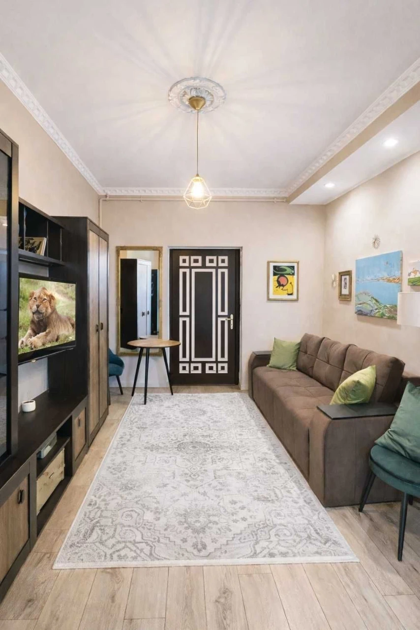 For Sale: Two-Story Apartment with Private Garden
