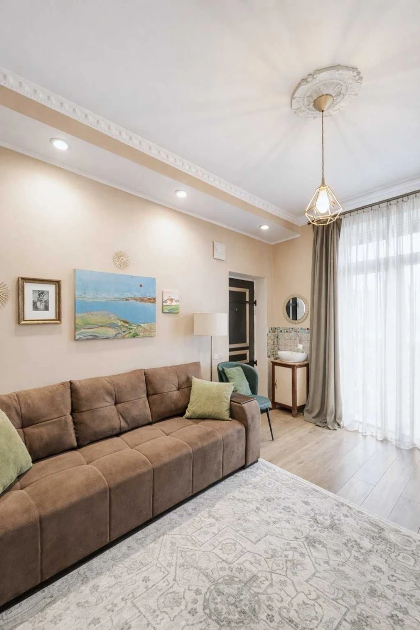 For Sale: Two-Story Apartment with Private Garden