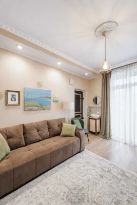 For Sale: Two-Story Apartment with Private Garden
