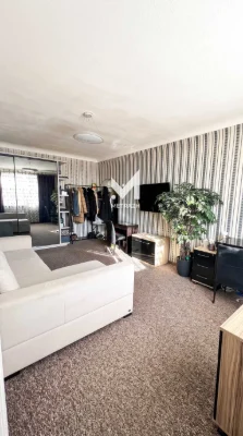 For sale, 2-bedroom apartment in the heart of the city, house with a spire.
