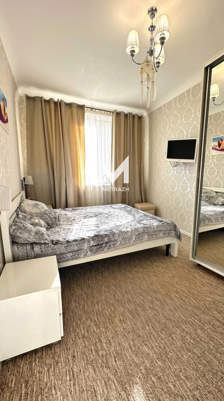 For sale, 2-bedroom apartment in the heart of the city, house with a spire.