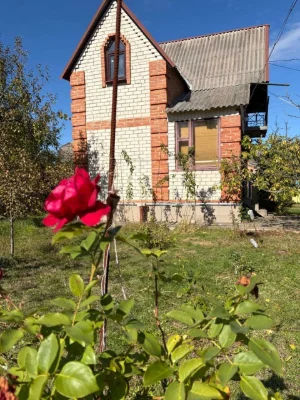 Vacant lot with house