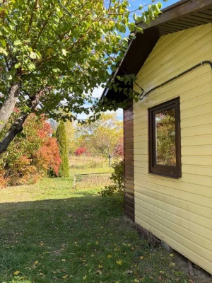 Vacant lot with house