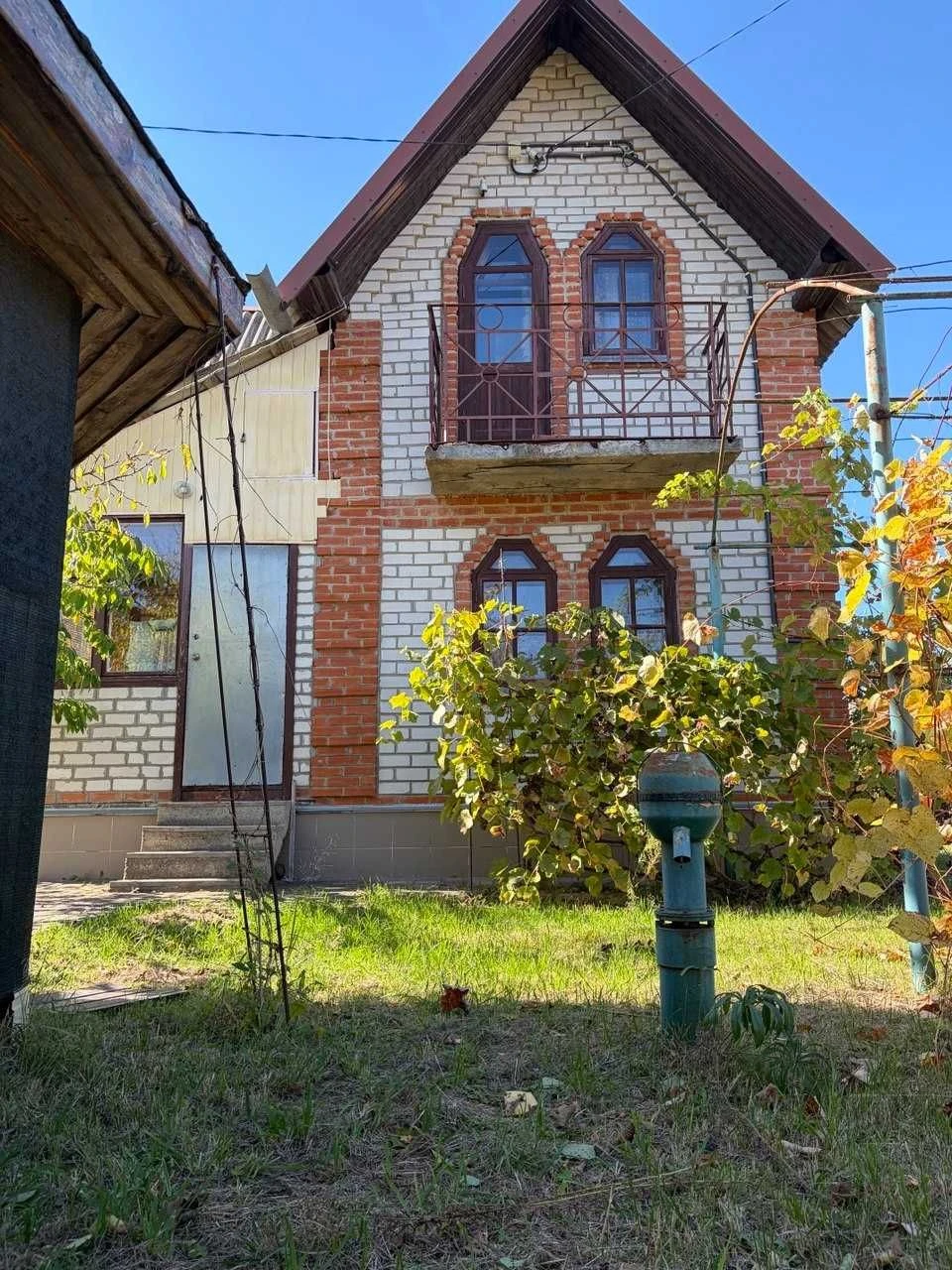 Vacant lot with house