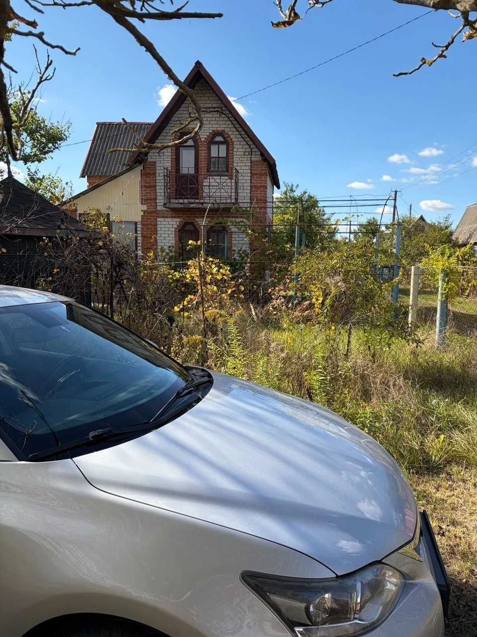 Vacant lot with house