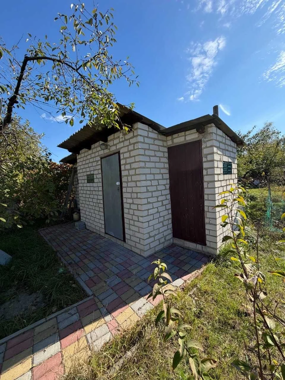 Vacant lot with house