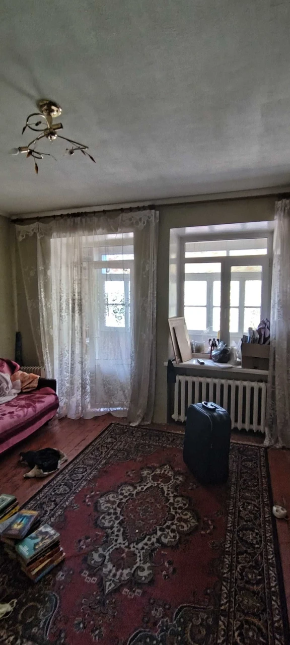 Комната в коммунальной квартире в районе рынка Колос.