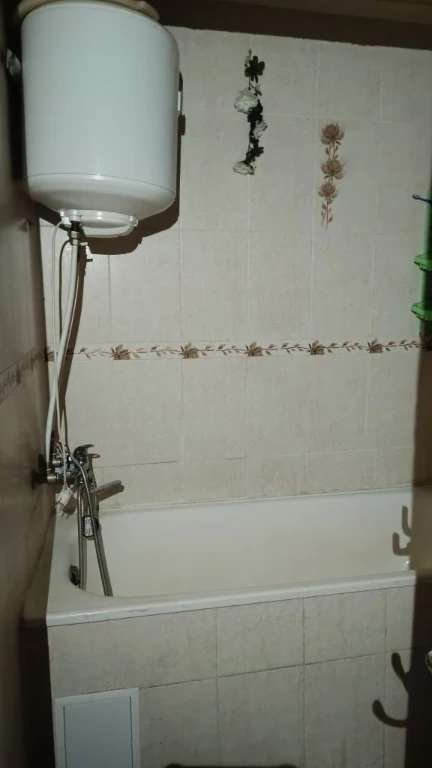 Room in a dormitory. Private bathroom.