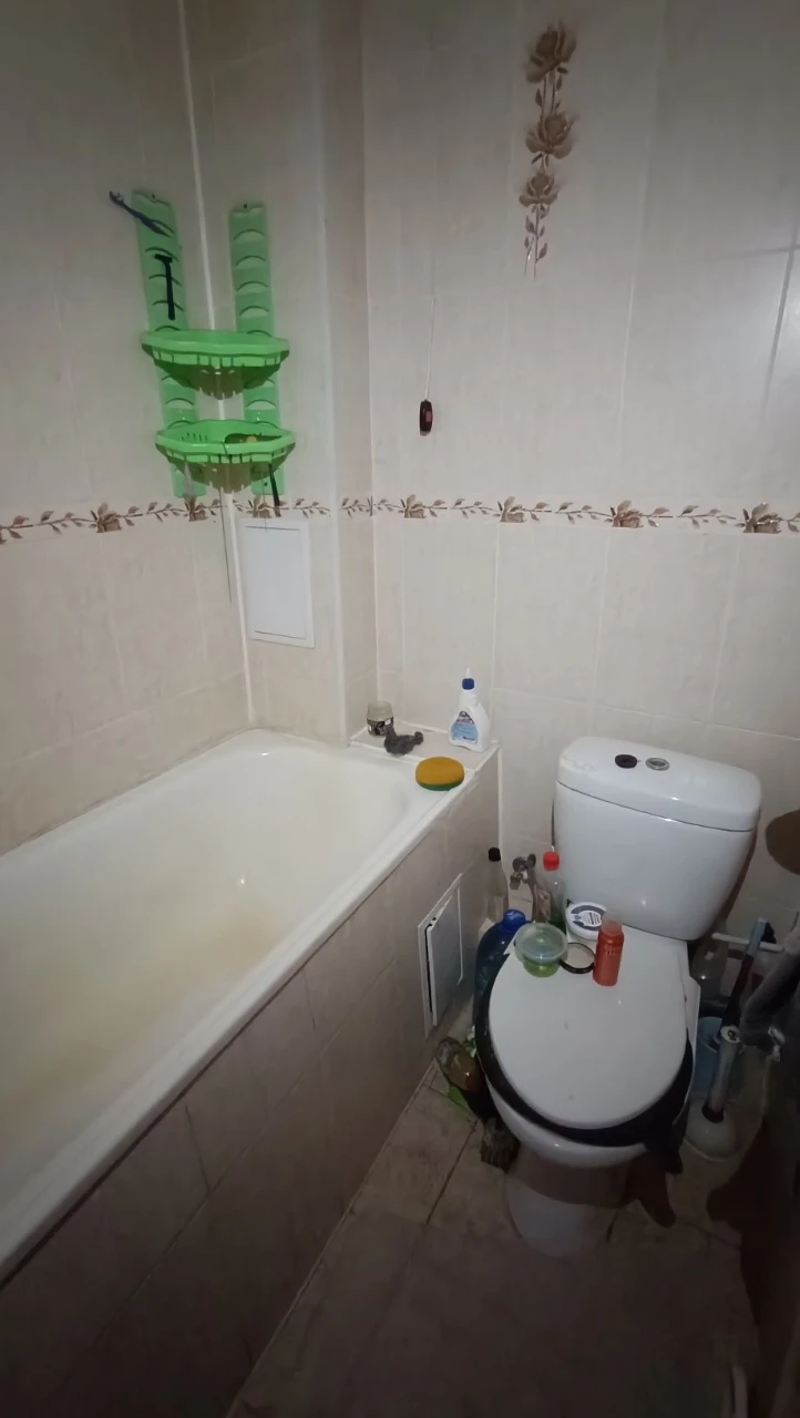Room in a dormitory. Private bathroom.
