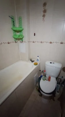 Room in a dormitory. Private bathroom.