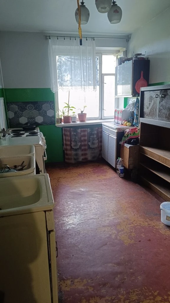 Room in a dormitory. Private bathroom.