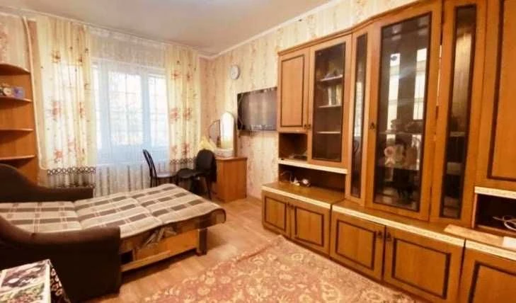 Room in an apartment in Academician Korolev Street