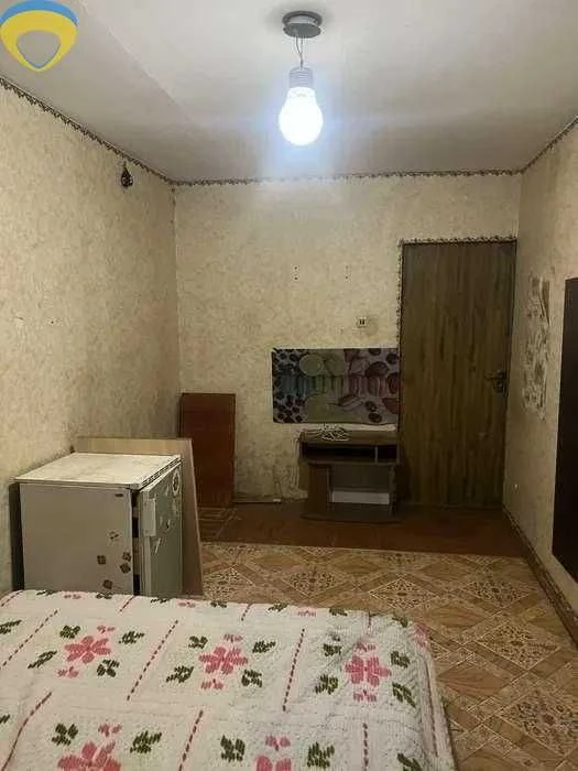 Room for sale in a communal apartment in Luzanov
