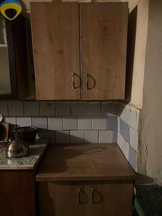 Room for sale in a communal apartment in Luzanov