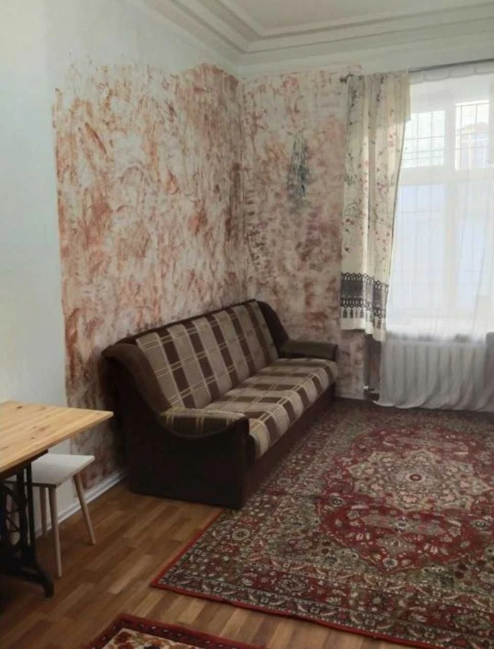 Продажа комнаты в коммуне в Центре