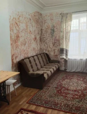 Продажа комнаты в коммуне в Центре
