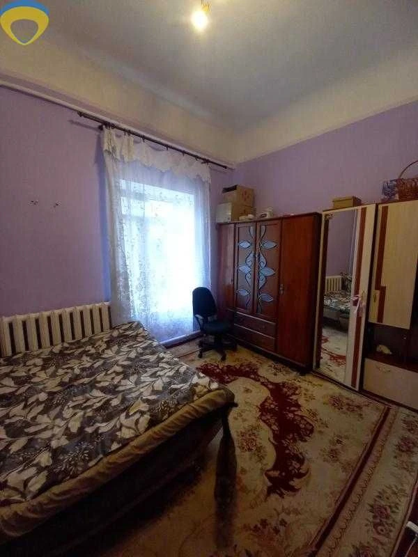 Продам комнату в центре города на улице Нежинская.