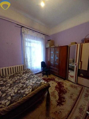 Продам комнату в центре города на улице Нежинская.