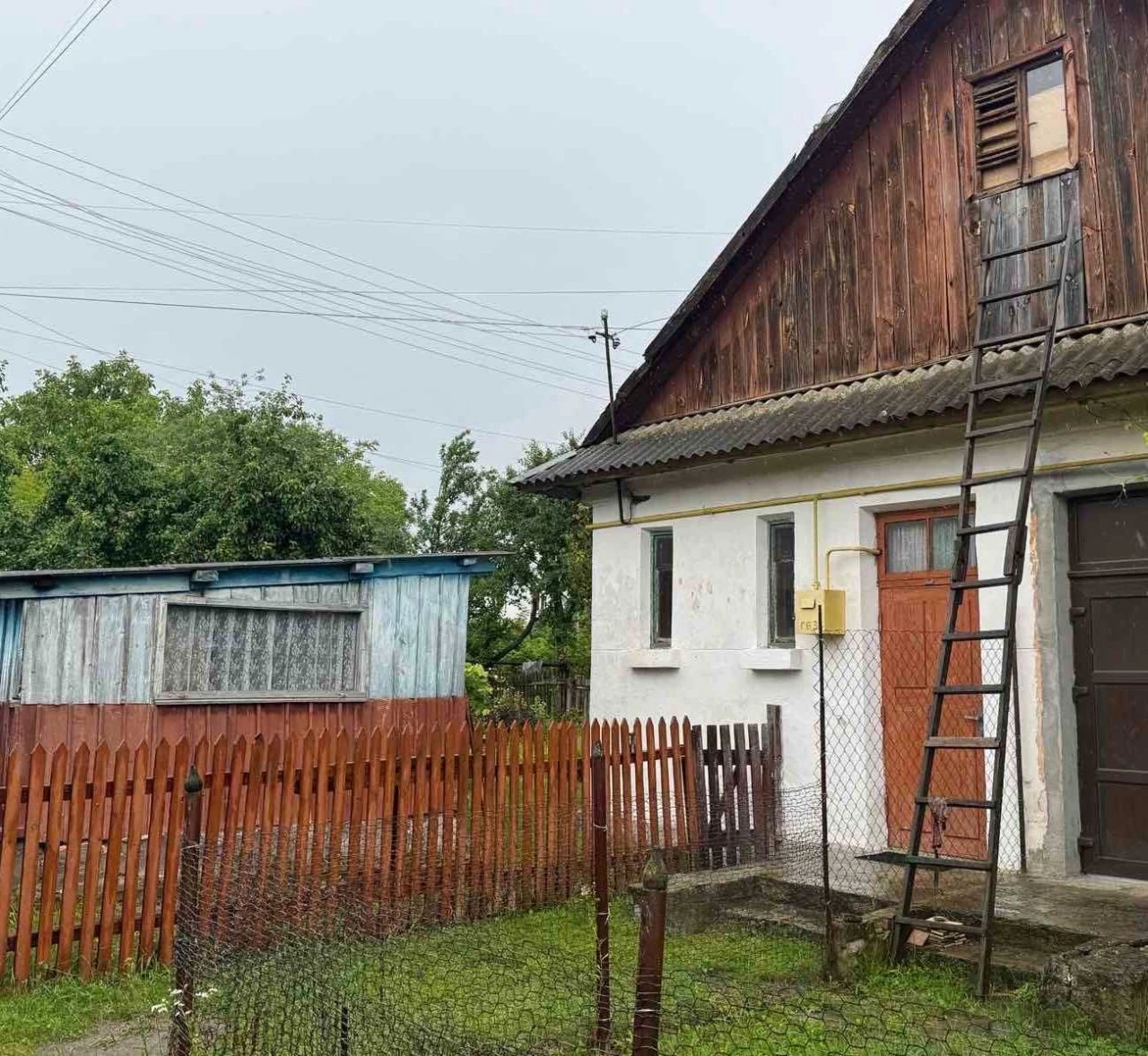 2-комнатная квартира с участком и гаражом