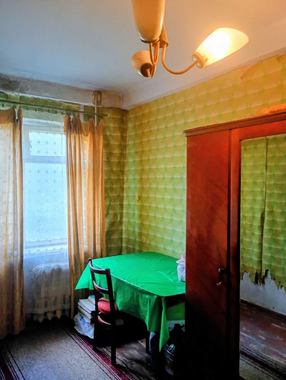 Selling a three-room apartment at the price of a one-room apartment.