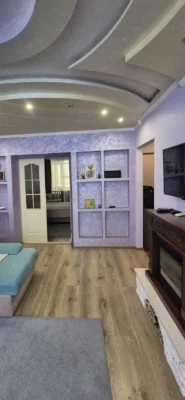For sale 5-room apartment, with central heating, left bank.