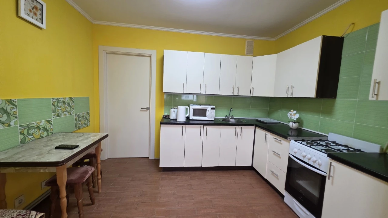 1-ROOM APARTMENT with furniture and appliances.