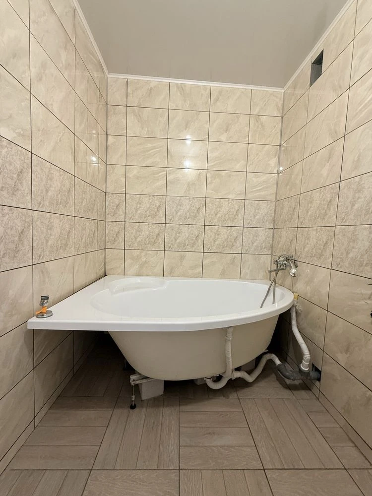 Sale of a four-room apartment. Oschadbank.