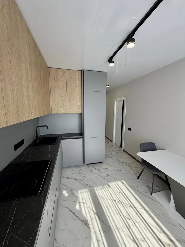 For Sale: Central 2-bedroom apartment. Newly renovated, never lived in.
