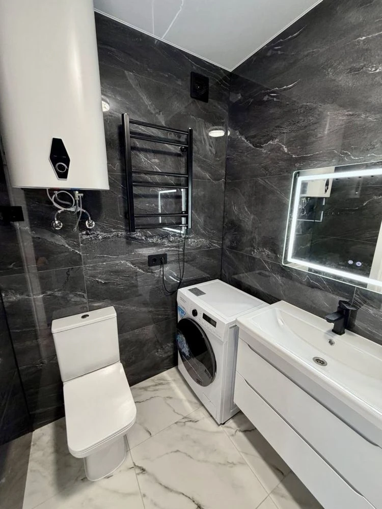 For Sale: Central 2-bedroom apartment. Newly renovated, never lived in.