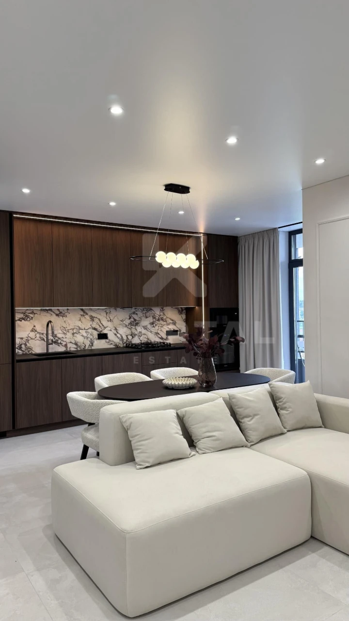 Spacious 3-bedroom apartment with designer renovation in residential complex