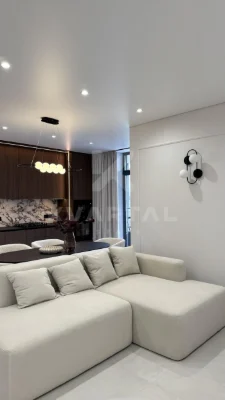 Spacious 3-bedroom apartment with designer renovation in residential complex