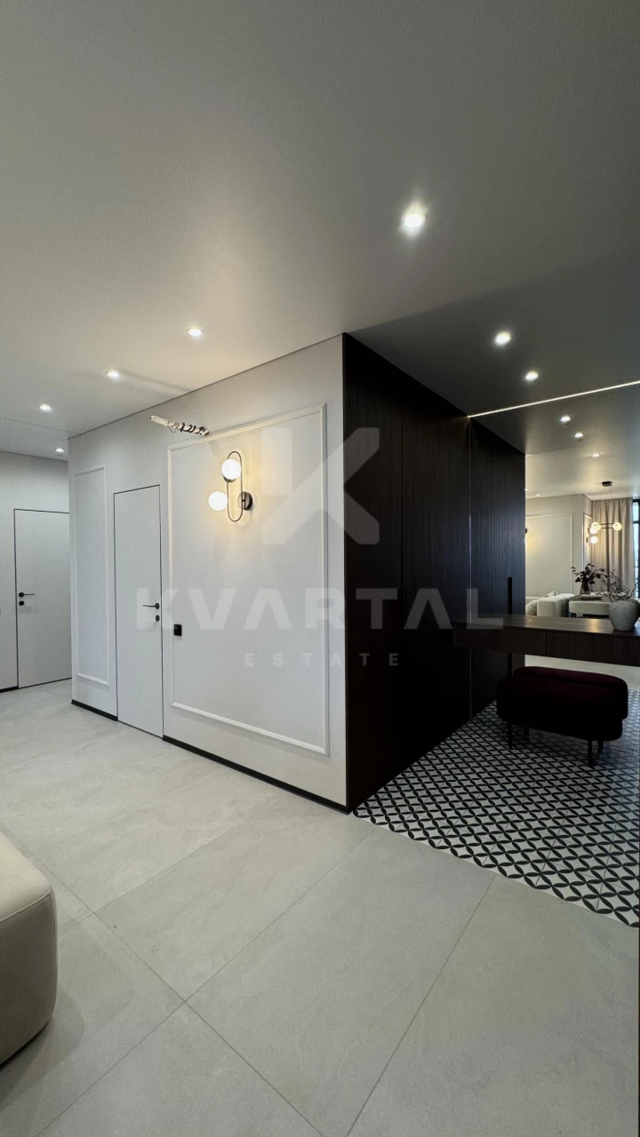 Spacious 3-bedroom apartment with designer renovation in residential complex