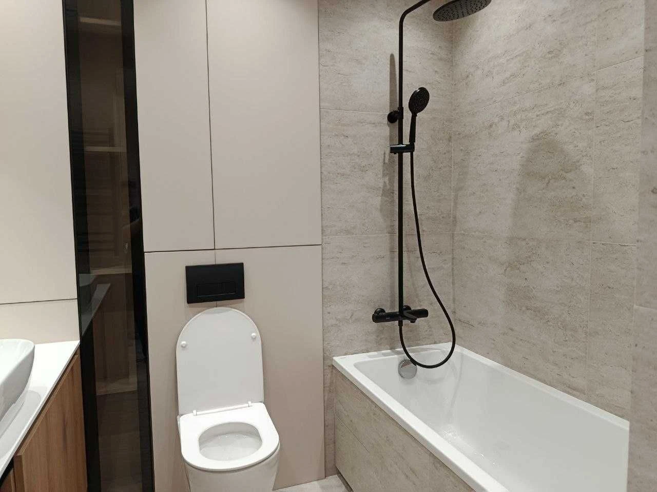 For Sale: Modern 1-Bedroom Apartment with Designer Renovation