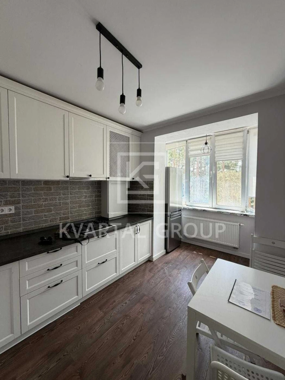Cozy two-bedroom apartment with renovation and furniture for sale