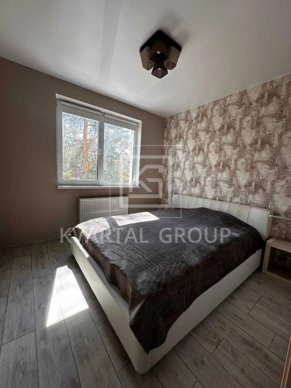 Spacious 1-bedroom apartment 48 sq m with a view of pine trees
