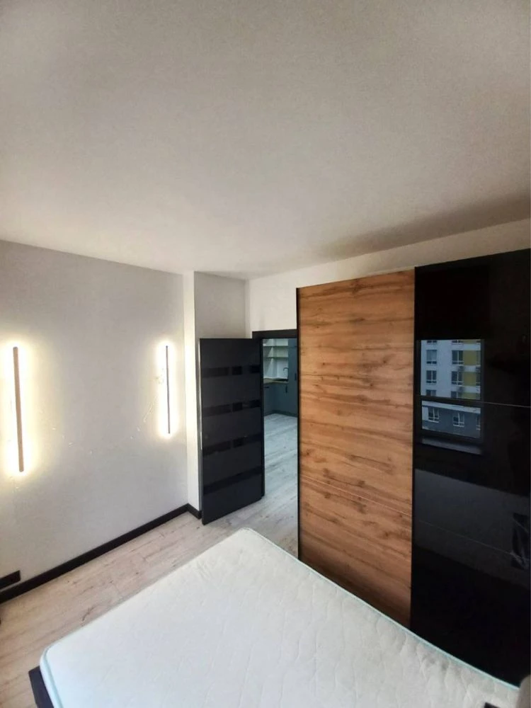 Modern 2-bedroom apartment with a large studio kitchen | Exit to Kyiv