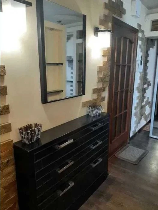 I am selling a 3-room apartment in Oleksiyivka.