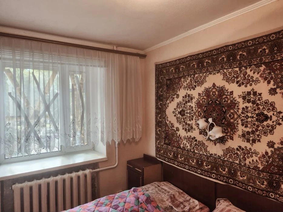 2-room apartment in the city center on Kultura Street. High-rise brick building.