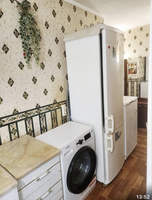 2-room apartment in the city center on Kultura Street. High-rise brick building.