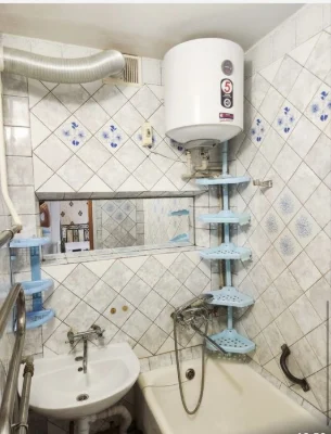 2-room apartment in the city center on Kultura Street. High-rise brick building.