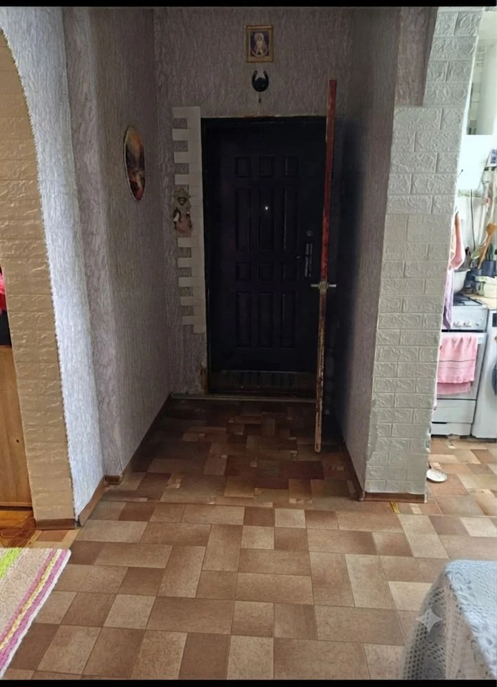 Sale of a one-room apartment on the first floor with a separate exit
