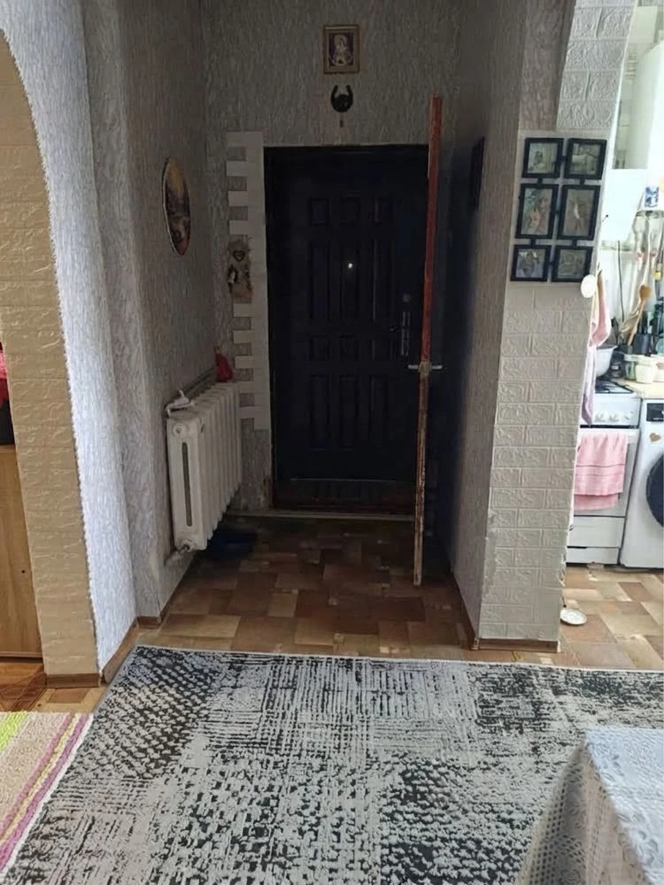 Sale of a one-room apartment on the first floor with a separate exit