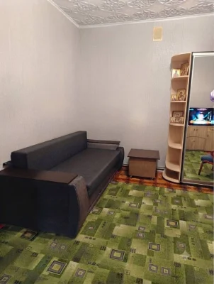 Sale of a one-room apartment on the first floor with a separate exit