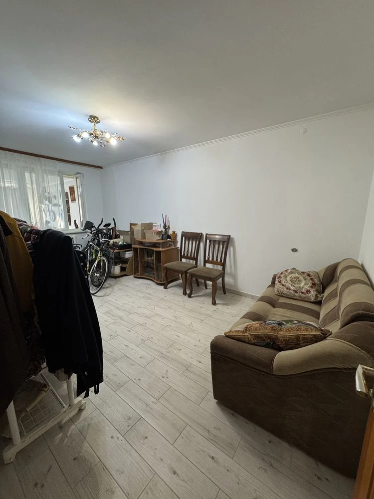 For sale is a spacious 3-bedroom apartment in the city center, on Шевchenko Street.