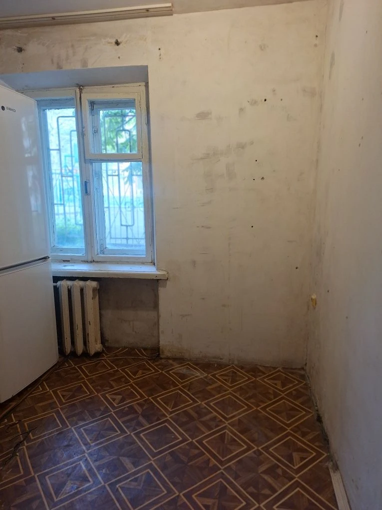 Продається 1 кімната 1/5, центр